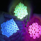 “Gyroids” created from the new solid fluorescent material.